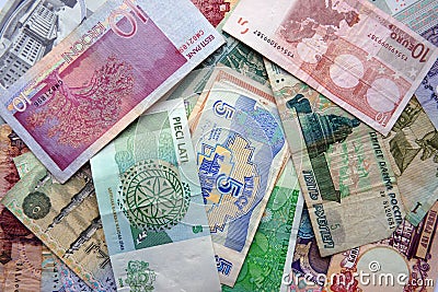 Many different banknotes from different countries Stock Photo