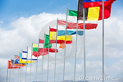 Many different flags waving on the wind Stock Photo