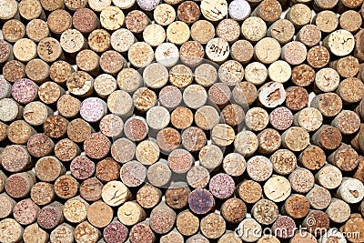 Many different used wine corks in the background Stock Photo