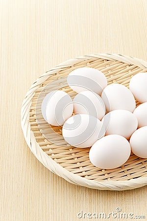 Many eggs on flat basket Stock Photo