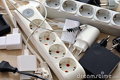Many electrical plugs network congestion. The concept of electrical dependence Stock Photo