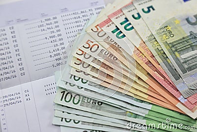 Many euro banknotes and bank account passbook show a lot of transactions. concept and idea of saving money, investment Stock Photo