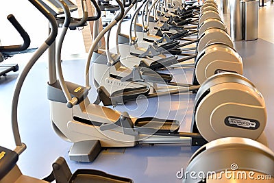 Many exercise bicycle in a fitness center Editorial Stock Photo