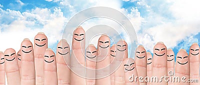 Many fingers with drawn faces Stock Photo