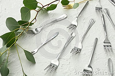 Many forks on white textured background Stock Photo