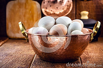 Many free-range eggs, large Brazilian eggs from chickens from minas gerais, in old rustic cuisine Stock Photo