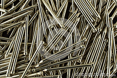 Many gold nail. Macro photo Stock Photo