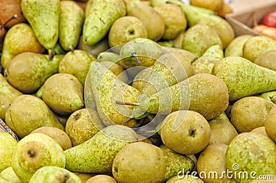 Many green pears at a famers supermarket Stock Photo