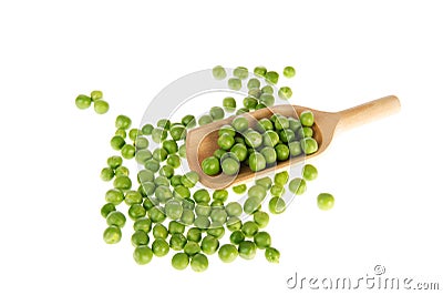 Many green peas with wooden spoon Stock Photo