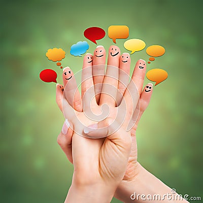 Many happy fingers with speech bubbles Stock Photo