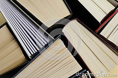 Many hardcover books as background, closeup view Stock Photo