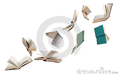 Many hardcover books flying on white background Stock Photo