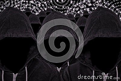 Many Hooded Faceless Computer Hackers with Binary Code Stock Photo