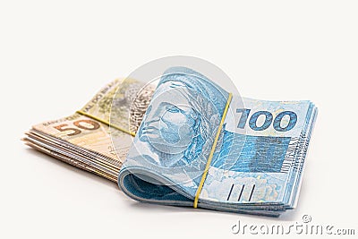 Many hundred and fifty reais banknotes, brazilian money, grand prize, payment, salary, on isolated white background Stock Photo