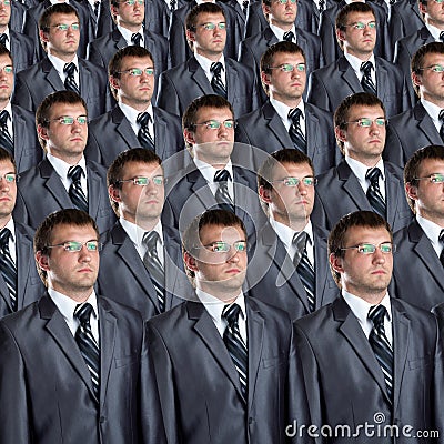 Many identical businessmen clones Stock Photo