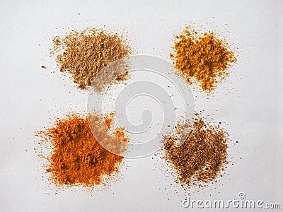 many spices including Ginger Curry Turmeric and Chili Pepper Stock Photo