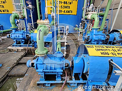 Many industrial pumps valves motor in blue color Stock Photo