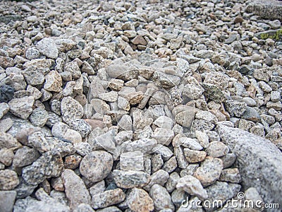 Many irregular rocks on o mountain path Stock Photo