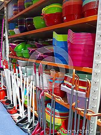 Cleaning and cooking tools on shelf Stock Photo