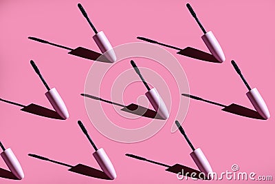 many mascara brushes on a pink Stock Photo