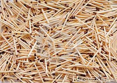 Many matches with brown match heads scattering on flat surface Stock Photo