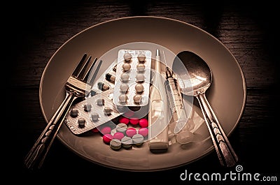 Many medications are dishes for the sick who could be administered to food. Stock Photo