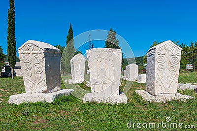 Many monumental medieval tombstones lie scattered in Herzegovina Stock Photo