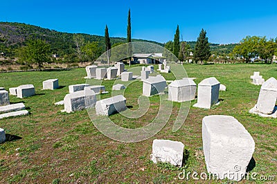 Many monumental medieval tombstones lie scattered in Herzegovina Stock Photo