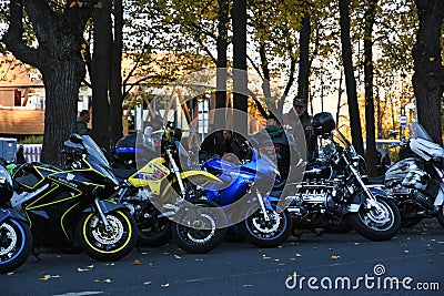 Many motorbikes stand in a row. Editorial Stock Photo