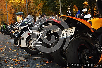 Many motorbikes stand in a row. Editorial Stock Photo