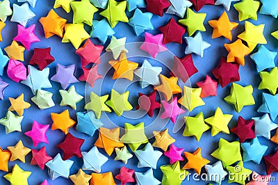 Many multicolored small origami stars Stock Photo