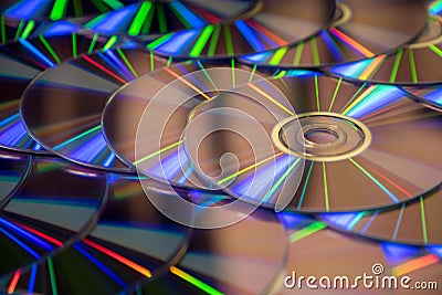 Many musical compact discs with a rainbow spectrum of colors as Stock Photo