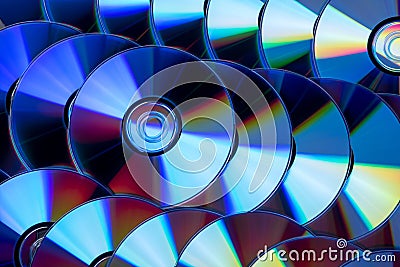 Many musical compact discs with a rainbow spectrum of colors as Stock Photo