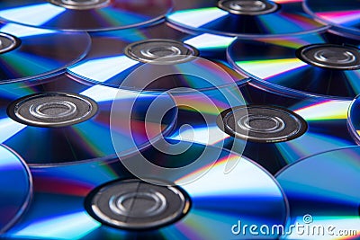 Many musical compact discs with a rainbow spectrum of colors as Stock Photo