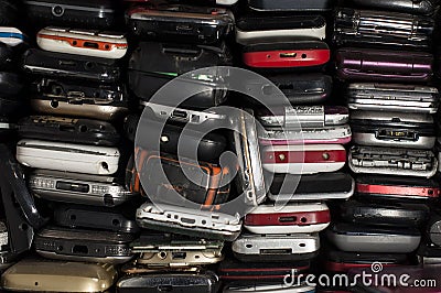 Many old mobile phones are technologically outdated, and some spare parts Stock Photo