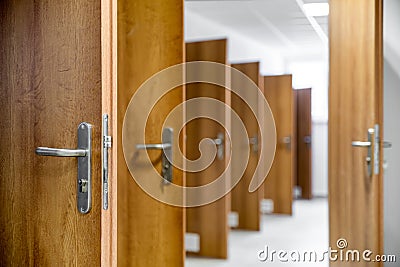 Many open doors in the hallway Stock Photo