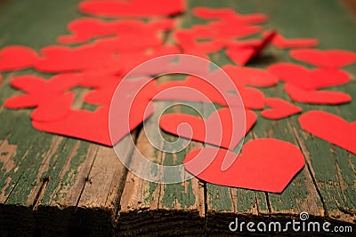 Many paper hearts on board Stock Photo