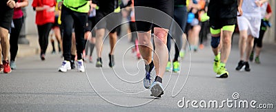 many people at footrace in the city Stock Photo