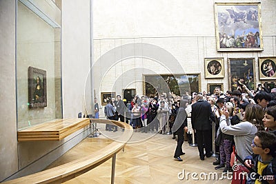 Many people in front of mona lisa in louvre museum Editorial Stock Photo