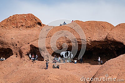 Many people hiking in the famous Hole in the Rock Editorial Stock Photo