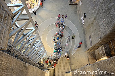 Many people in line to take the elevator of Salina Turda a salt mine turned into a underground tourist attraction Editorial Stock Photo