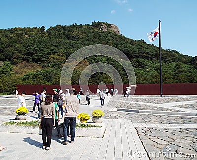 Many people at the mausoleum of Roh Moo-hyun, 16th president of South Korea. Bongha village Editorial Stock Photo