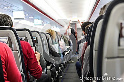 People are sitting on the plane Editorial Stock Photo