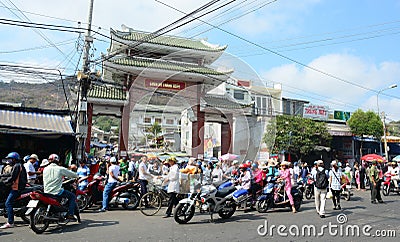 Many people and vehicles on the street in Chau Doc, Vietnam Editorial Stock Photo