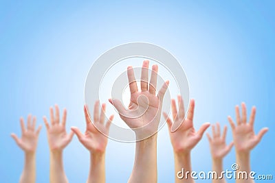 Many people women hands raising up on world map background showing vote, volunteer participation, rights equality concept Stock Photo