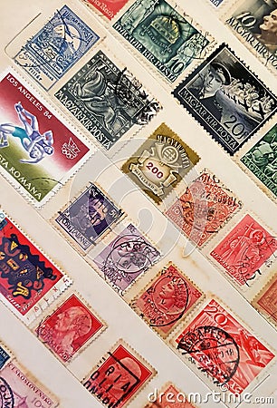 many postage stamps in a philatelic file Editorial Stock Photo