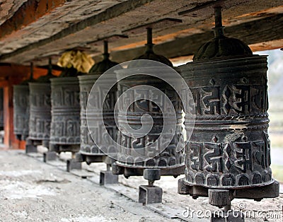 Many prayer wheels Stock Photo