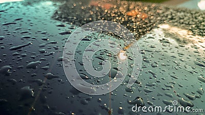 Many of raindrops stuck on the windshield background,Abstract of raindrops on the mirror made with color filters. Stock Photo