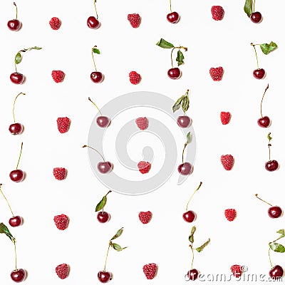 Many raspberries and cherries arranged on square Stock Photo