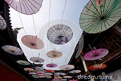 Many retro Asian oiled paper umbrellas Stock Photo